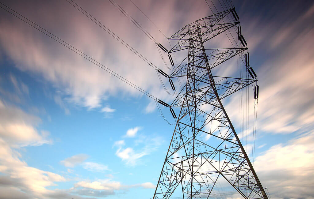 Stockfoto Strommast für Sicherheitskonzept Energieunternehmen